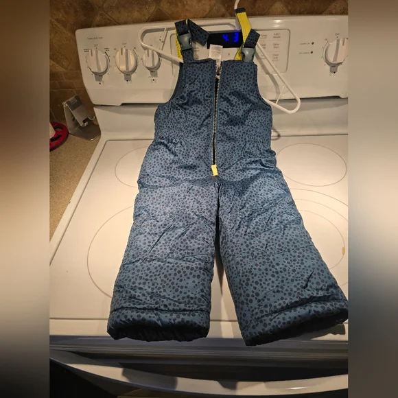 Bright Blue Puffer Jacket with Yellow Accents - Picture 5 of 9